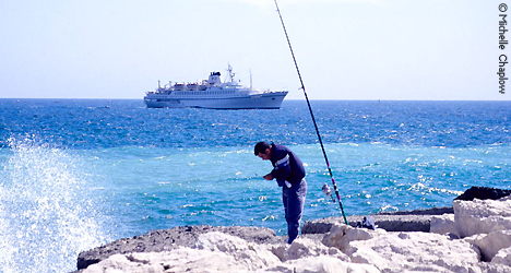 &copy; Michelle Chaplow Fishing by the port