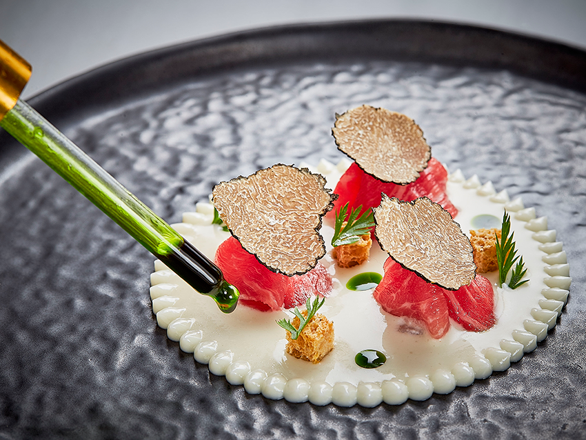 Juanlu, the chef-owner of LU in Jerez, uses traditional French sauces in his dishes. Juanlu, the chef-owner of LU in Jerez, uses traditional French sauces in his dishes.