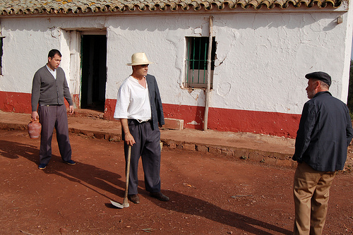 A still from on location: the father (centre) confronts his brother (right) outside the house which is the subject of family conflict. Photo: Javier Polo A still from on location: the father (centre) confronts his brother (right) outside the house which is the subject of family conflict. Photo: Javier Polo