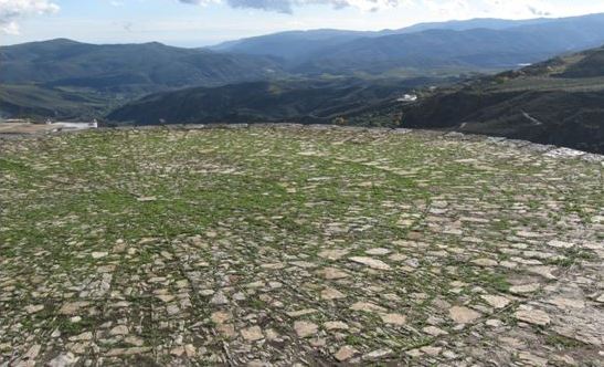 These traditional stone threshing floors were restored for the project; they had been buried under the earth for years.