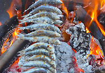 This is a traditional way of cooking freshly-caught sea fish, most often sardines. Try it on a beach on the Costa del Sol! This is a traditional way of cooking freshly-caught sea fish, most often sardines. Try it on a beach on the Costa del Sol!