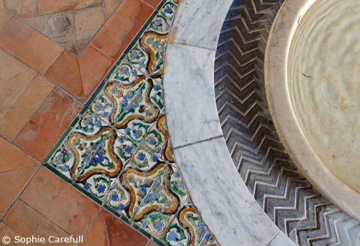 Hand-painted tiles and water fountains adorn Seville's grand Alcazar. © Sophie Carefull  
