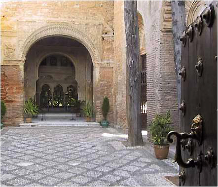 Moorish courtyard inside the old Monastery (current Parador). © Lawrence Bohme