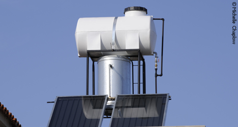 Eco friendly water heating with solar panels © Michelle Chaplow