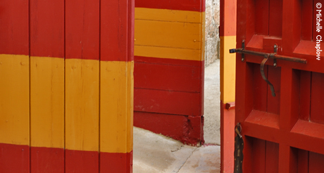 The traditional strong blood red and ochre colours of the bullring doors © Michelle Chaplow The traditional strong blood red and ochre colours of the bullring doors © Michelle Chaplow