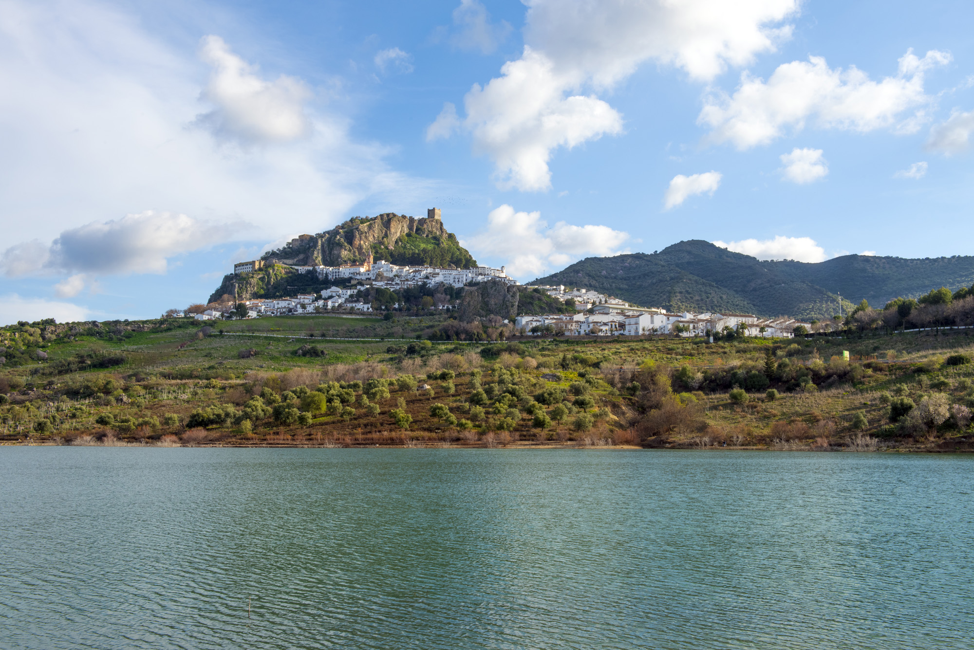 Amidst the sparkling reservoir and rugged terrain, Zahara de la Sierra exudes cinematic grandeur. © Michelle Chaplow