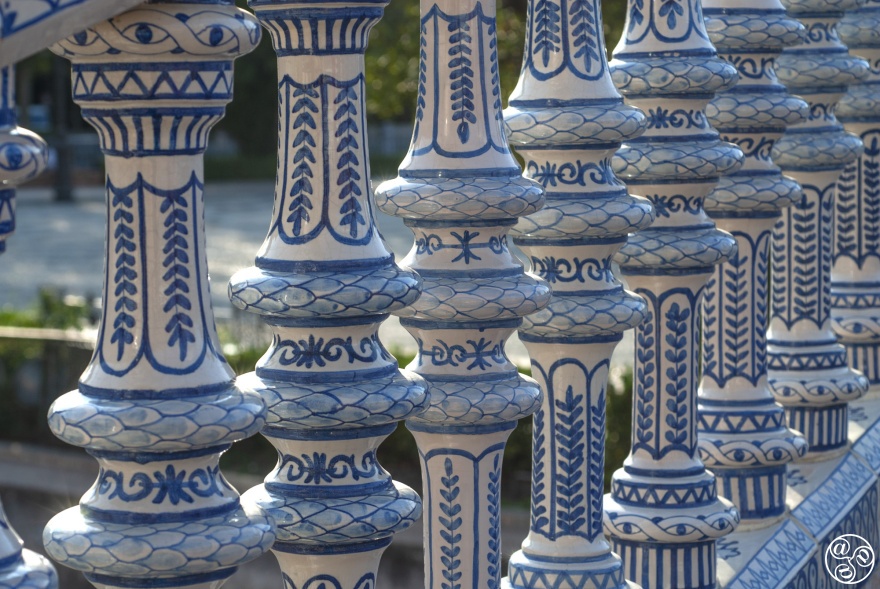 Blue-and-white ceramic tiles at Plaza de España in Seville, featuring traditional Andalusian patterns © Michelle Chaplow