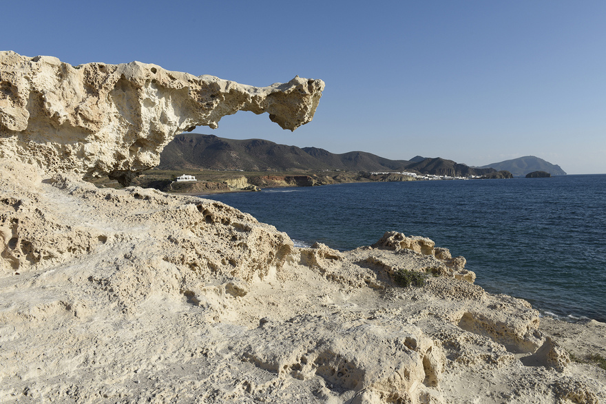 The Fossil Dunes of Los Escullos, a famous natural monument - fossilized sand dunes which have turned to soft stone with a strange, arm-like section jutting out. © Michelle Chaplow