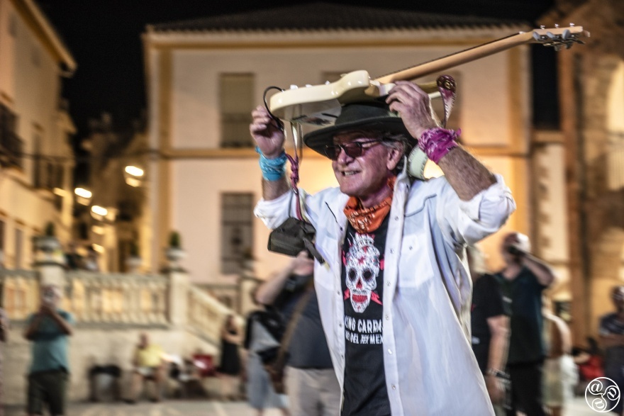 Joe King Carrasco takes his guitar into the audience as he performs in Cortes de La Frontera in 2024