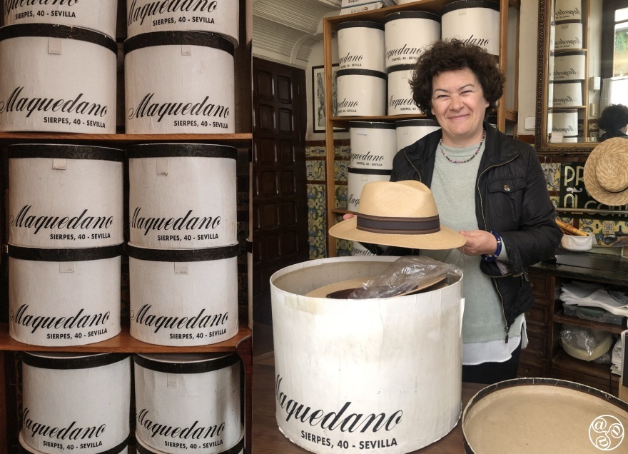 Cristina Vega inside her historic hat shop, Sombrerería Maquedano in Seville, with towers of vintage hatboxes. © Fiona Flores