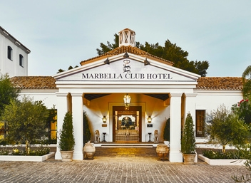 The iconic entrance of Marbella Club, where timeless elegance  meets coastal charm.© Marbella Club