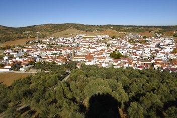 View from the Castle to the village of Alanis, which sits at the foot of the Sierra Norte mountain range. © Michelle Chaplow