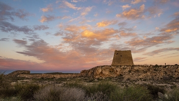 The tower was rebuilt as a horseshoe-shaped fortified tower in 1766 on the orders of Charles III, to protect the coast from Barbary Pirates. © Michelle Chaplow