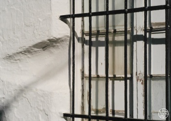 The traditional Andalucian window. The cut within the wall was to allow girls from the "safety" of their home to chat and whisper to passers by and potential suitors. Windows and life in Andalucia have come on a long way! © Michelle Chaplow The traditional Andalucian window. The cut within the wall was to allow girls from the "safety" of their home to chat and whisper to passers by and potential suitors. Windows and life in Andalucia have come on a long way! © Michelle Chaplow