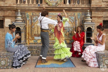 The gorgeous flamenco dresses for women and the "trajes cortos" (short suits) for men. © Michelle Chaplow