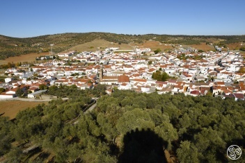 View from the Castle to the village of Alanis, which sits at the foot of the Sierra Norte mountain range. © Michelle Chaplow