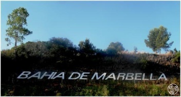 Signs of the times, 'MARBELLA BAY' road sign near Hospital Costa del Sol