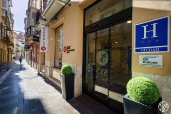 Sunny street view outside Exe Málaga Museos Hotel ©Booking.com/Exe Málaga Museos