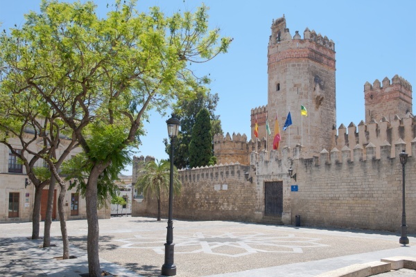 Explore the historic Plaza de Alfonso X El Sabio in El Puerto de Santa María, a charming square surrounded by beautiful architecture, local cafes, and rich local culture © Michelle Chaplow