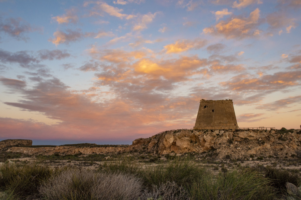 The tower was rebuilt as a horseshoe-shaped fortified tower in 1766 on the orders of Charles III, to protect the coast from Barbary Pirates. © Michelle Chaplow