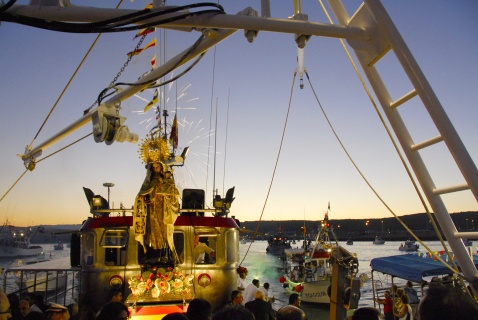 Sailing in Barbate during the vibrant celebration of the Virgin del Carmen, the patron saint of fishermen. Each year on July 16th, this picturesque fishing town, along with many others, honors her with lively festivities and maritime processions. © Michelle Chaplow
