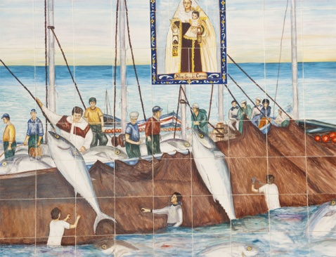 Traditional almadraba tuna fishing depicted on tiles the church in Conil