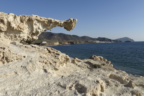 The Fossil Dunes of Los Escullos, a famous natural monument - fossilized sand dunes which have turned to soft stone with a strange, arm-like section jutting out. © Michelle Chaplow