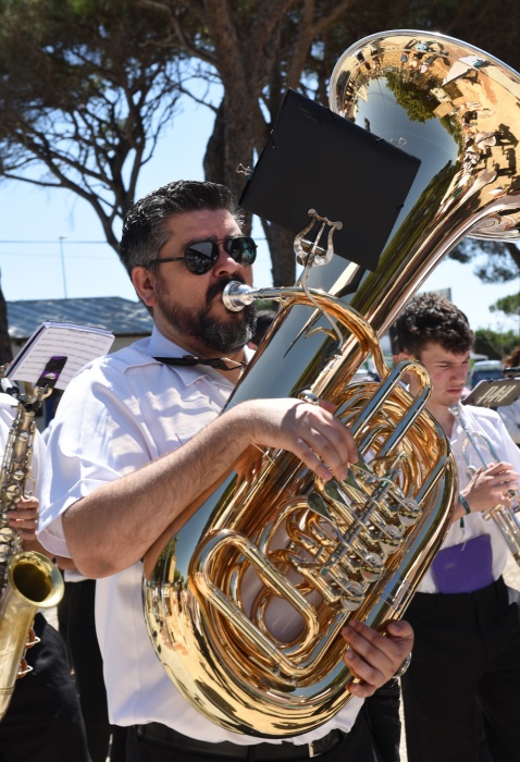 Accompanying the procession is a lively brass band, (c) Michelle Chaplow