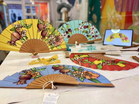 Collection of hand painted fans by Silvia Ramos