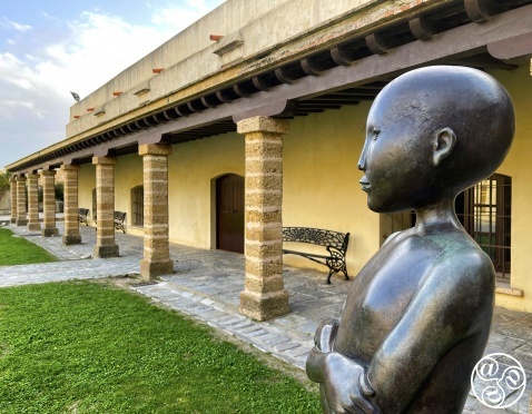 Muchacho desnudo (Nude boy) by sculptor Cornelis Zitman is a permanent art work in the main patio of the Castillo de Santa Catalina in Cadiz.