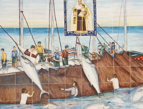 Traditional almadraba tuna fishing depicted on tiles the church in Conil