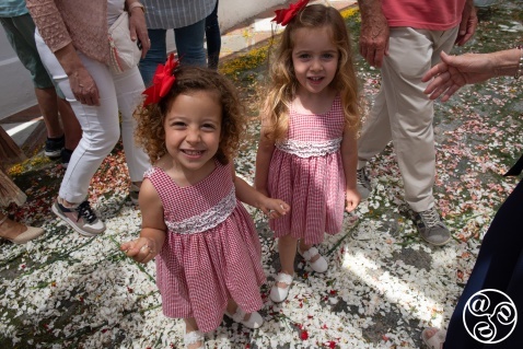 The little children are so excited to be able to walk and play in the petals of the flowers after the procession has gone by. The little children are so excited to be able to walk and play in the petals of the flowers after the procession has gone by. © Michelle Chaplow
