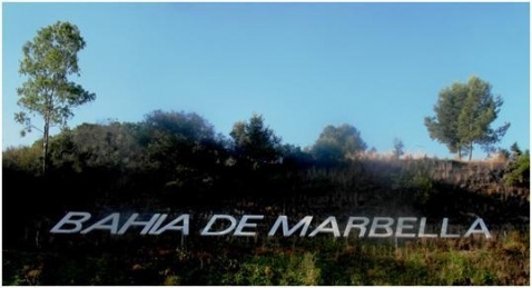 Signs of the times, 'MARBELLA BAY' road sign near Hospital Costa del Sol